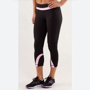 < Lululemon Athletica Black and Pink Capri Leggings >